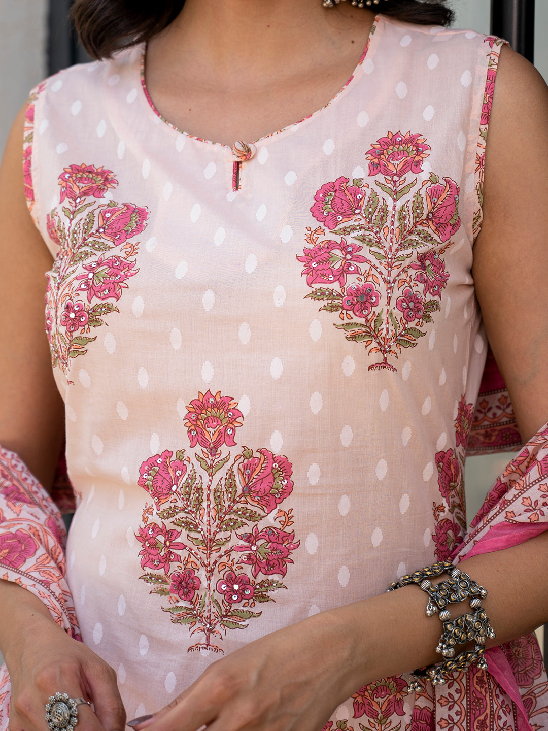 Pink floral printed cotton sleeveless top with embroidery and polka dot pattern