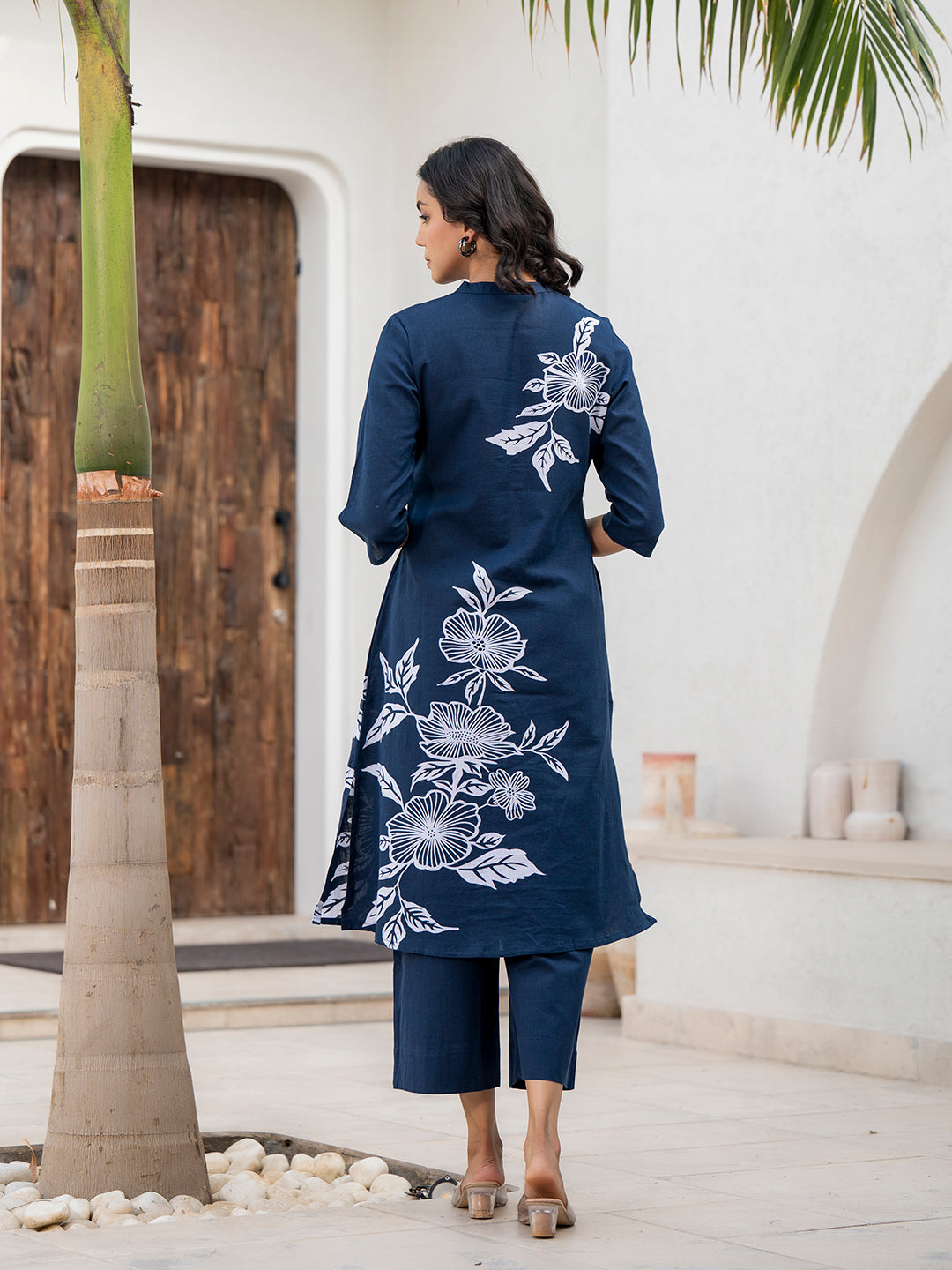 Navy blue floral printed cotton kurta with white embroidery on the back