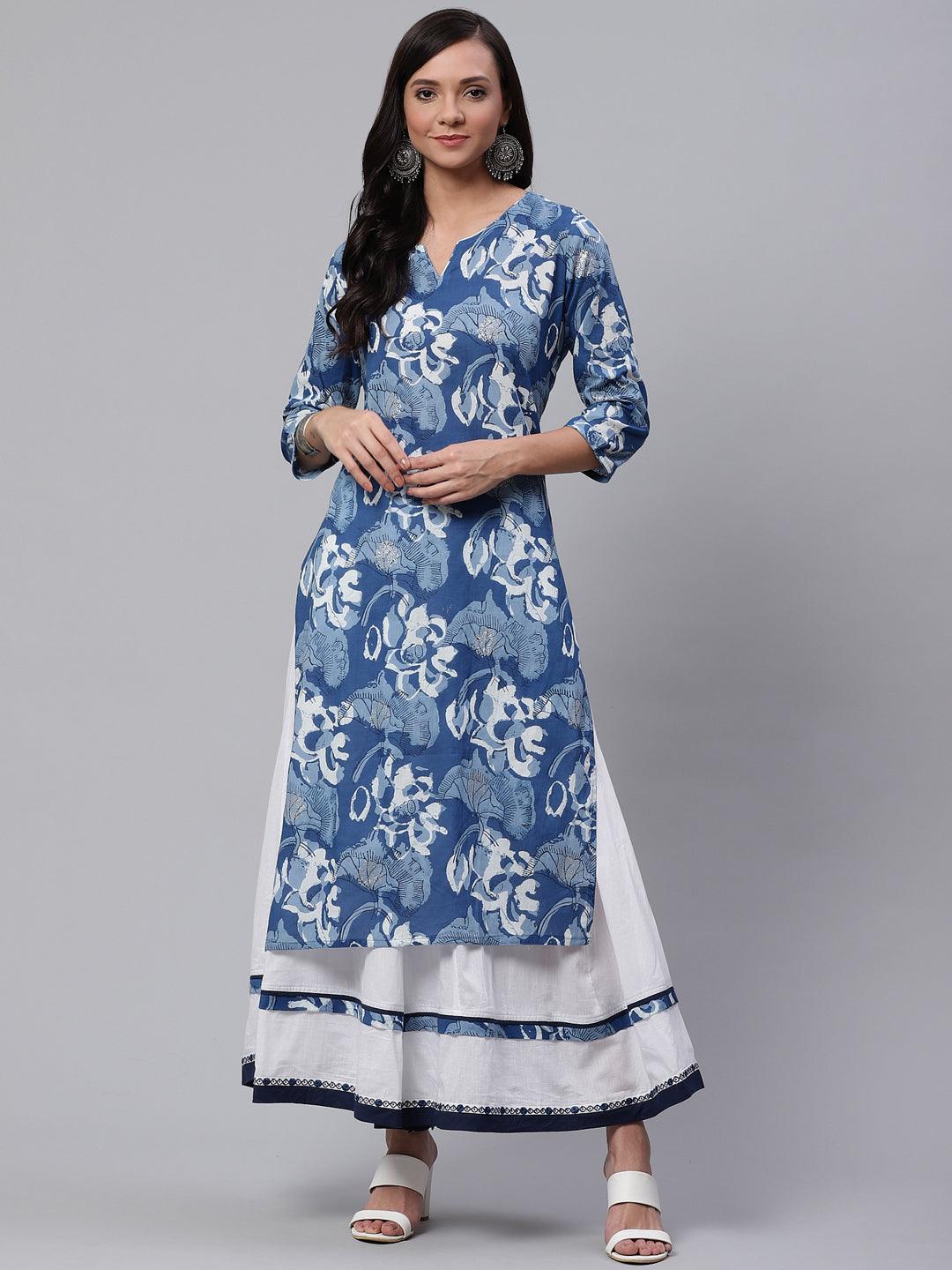 Woman wearing a Blue Cotton Kurta with Mulmul Sharara and floral patterns