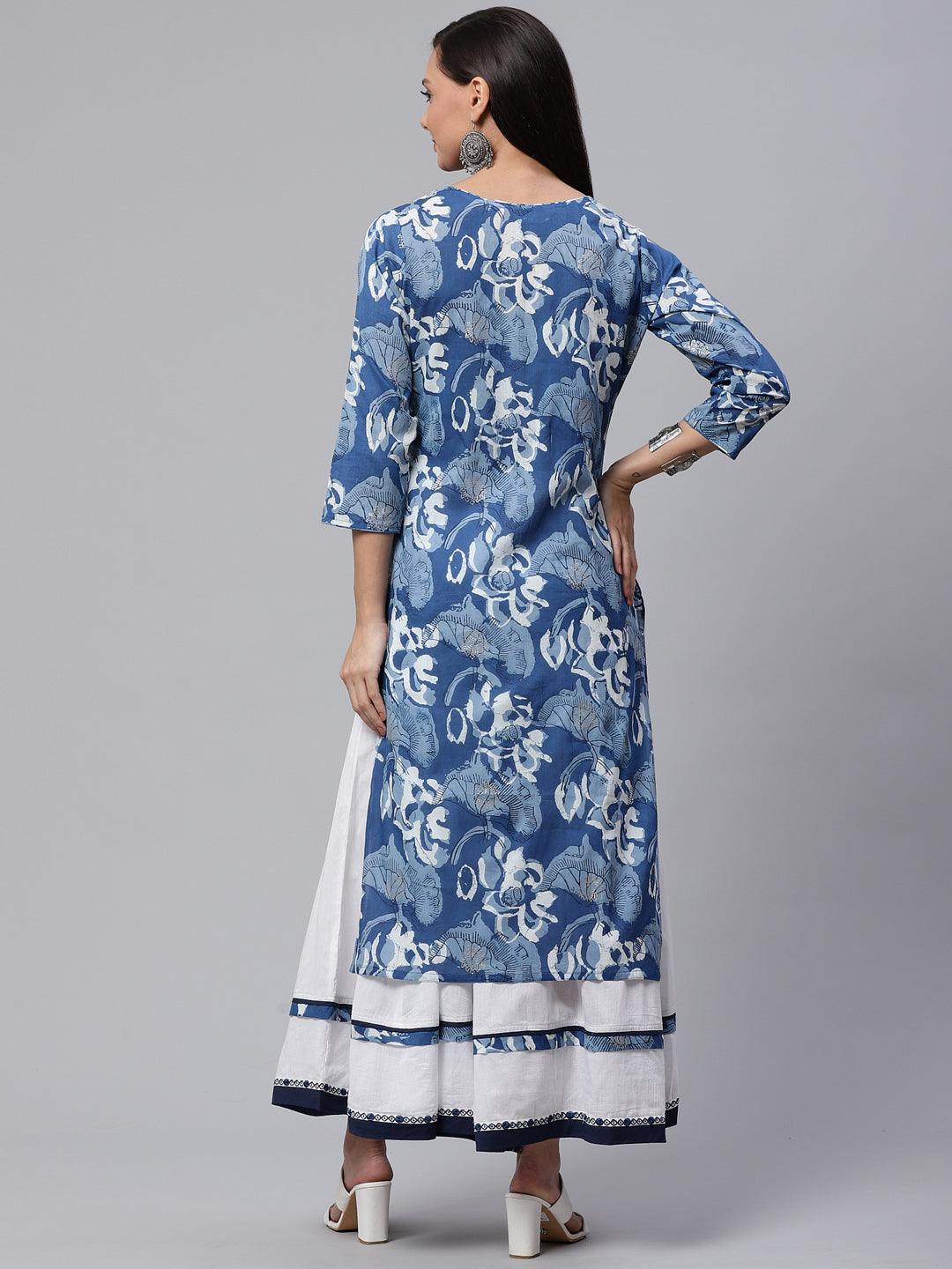 Blue Cotton Kurta worn with a white skirt featuring navy trim and floral print