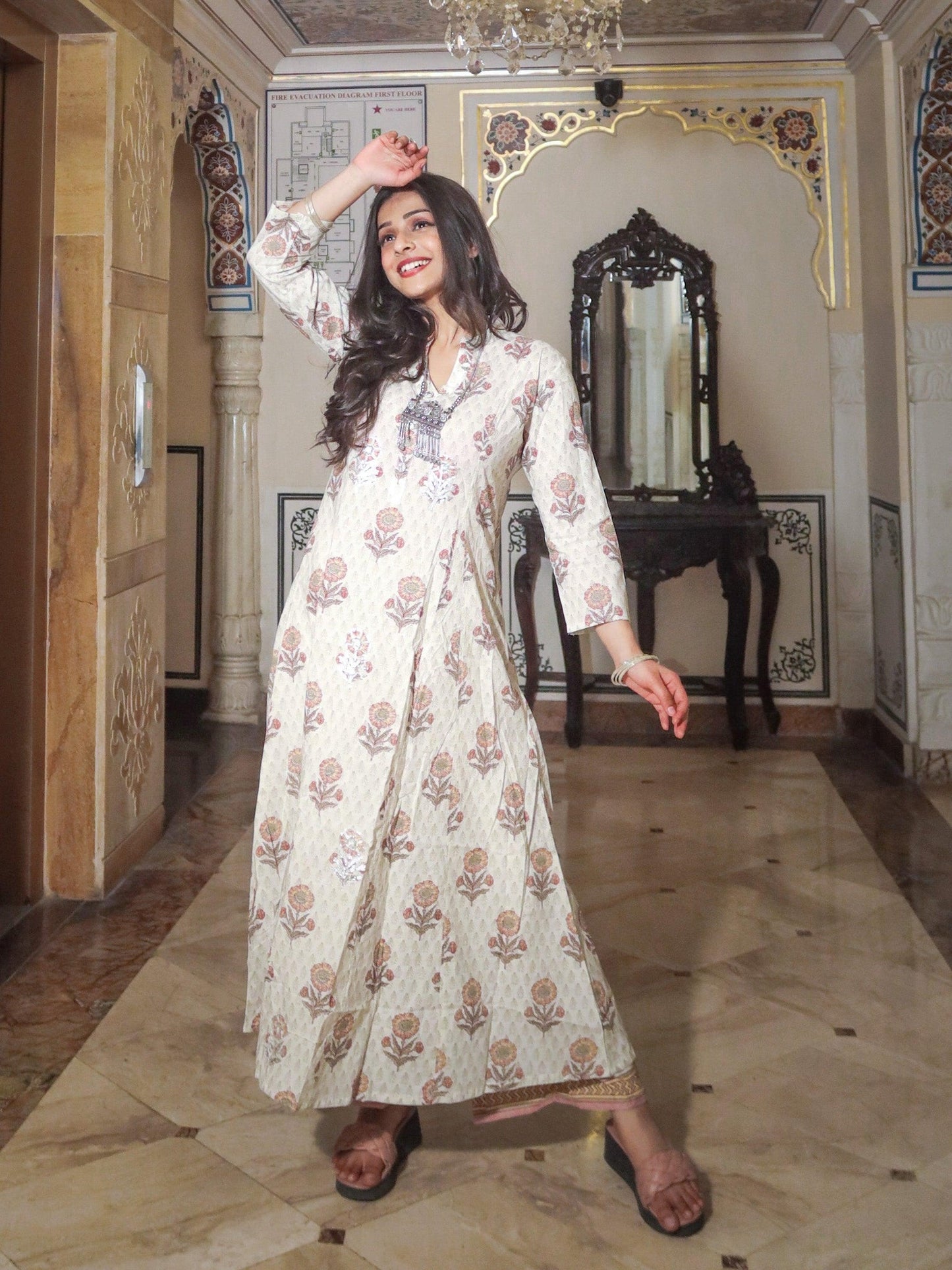 Long floral patterned dress with full sleeves in Ivory White Self Print Cotton Kurti Palazzo Set