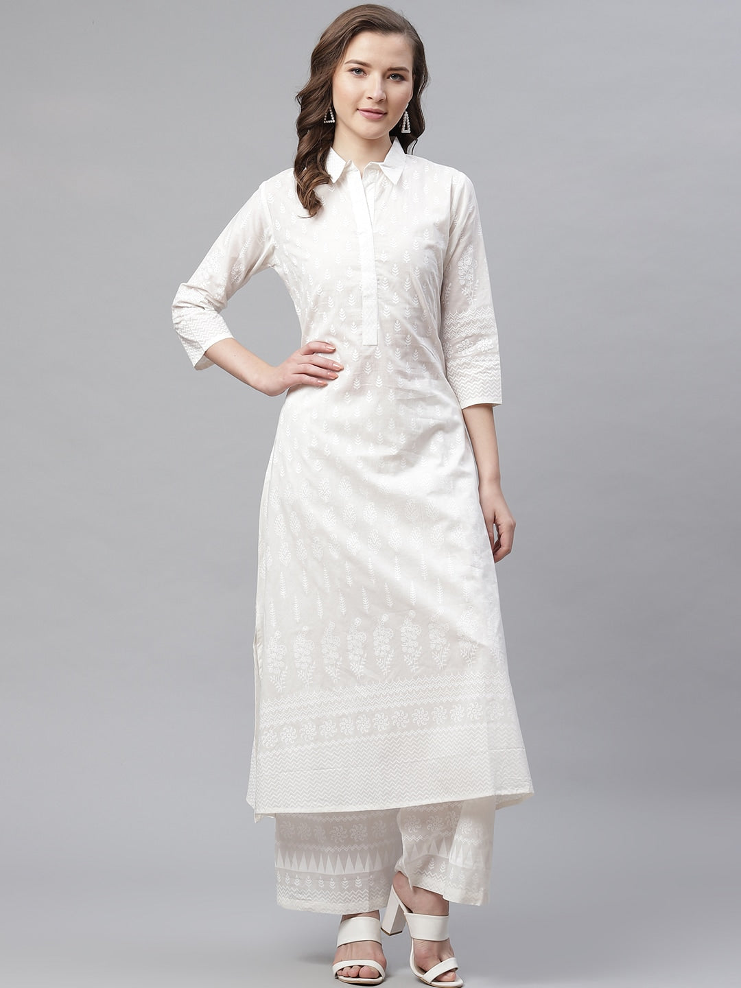 Woman wearing White Khari Print Cotton Kurti with Palazzo Set and three-quarter sleeves