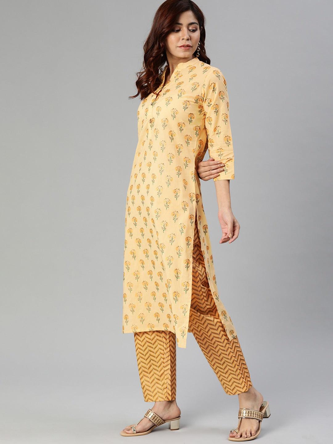 Yellow flower print cotton kurta set with patterned pants and stylish sandals