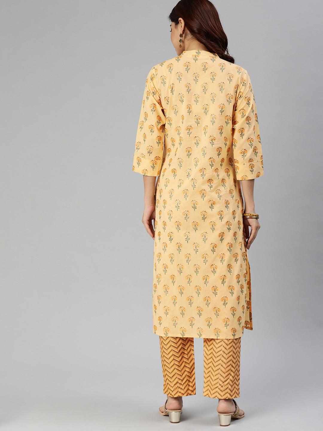 Yellow flower print cotton kurta set with three-quarter sleeves and matching pants