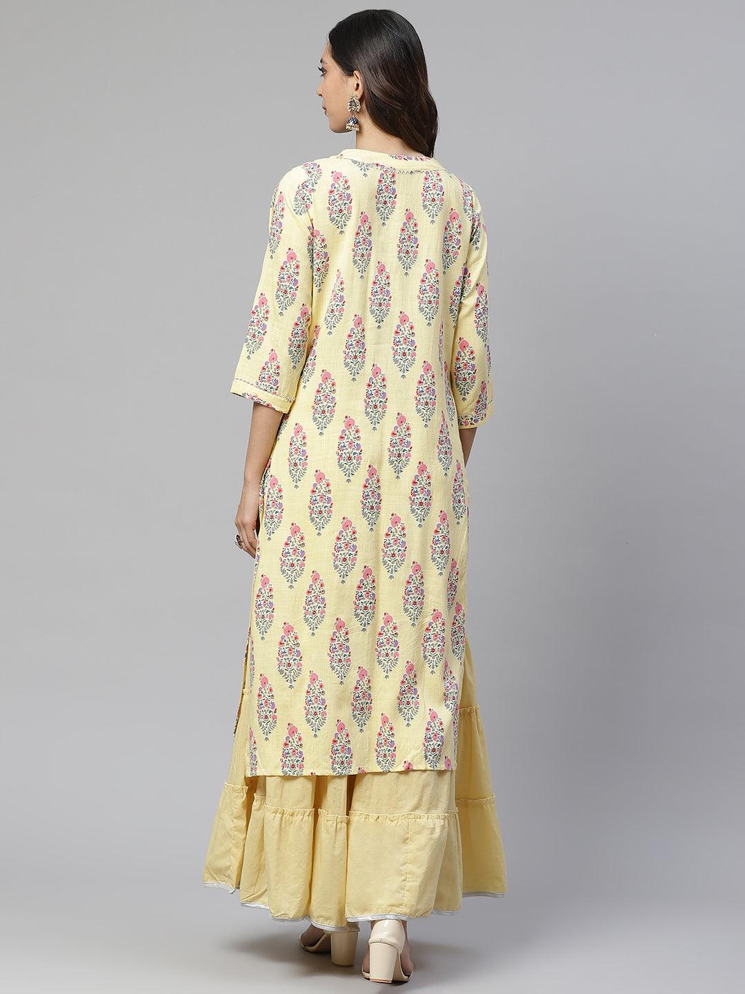 Long yellow rayon printed kurti over pale yellow skirt in a stylish kurti sharara set