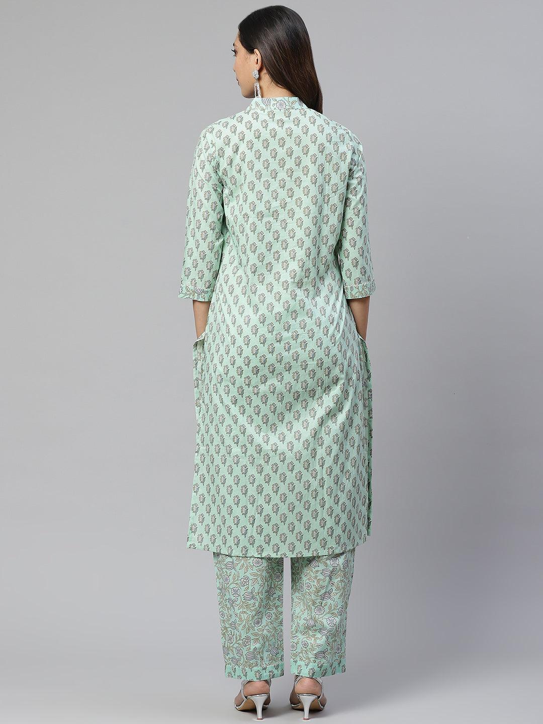 Mint green patterned kurta and pants set in sea green cotton worn by a woman