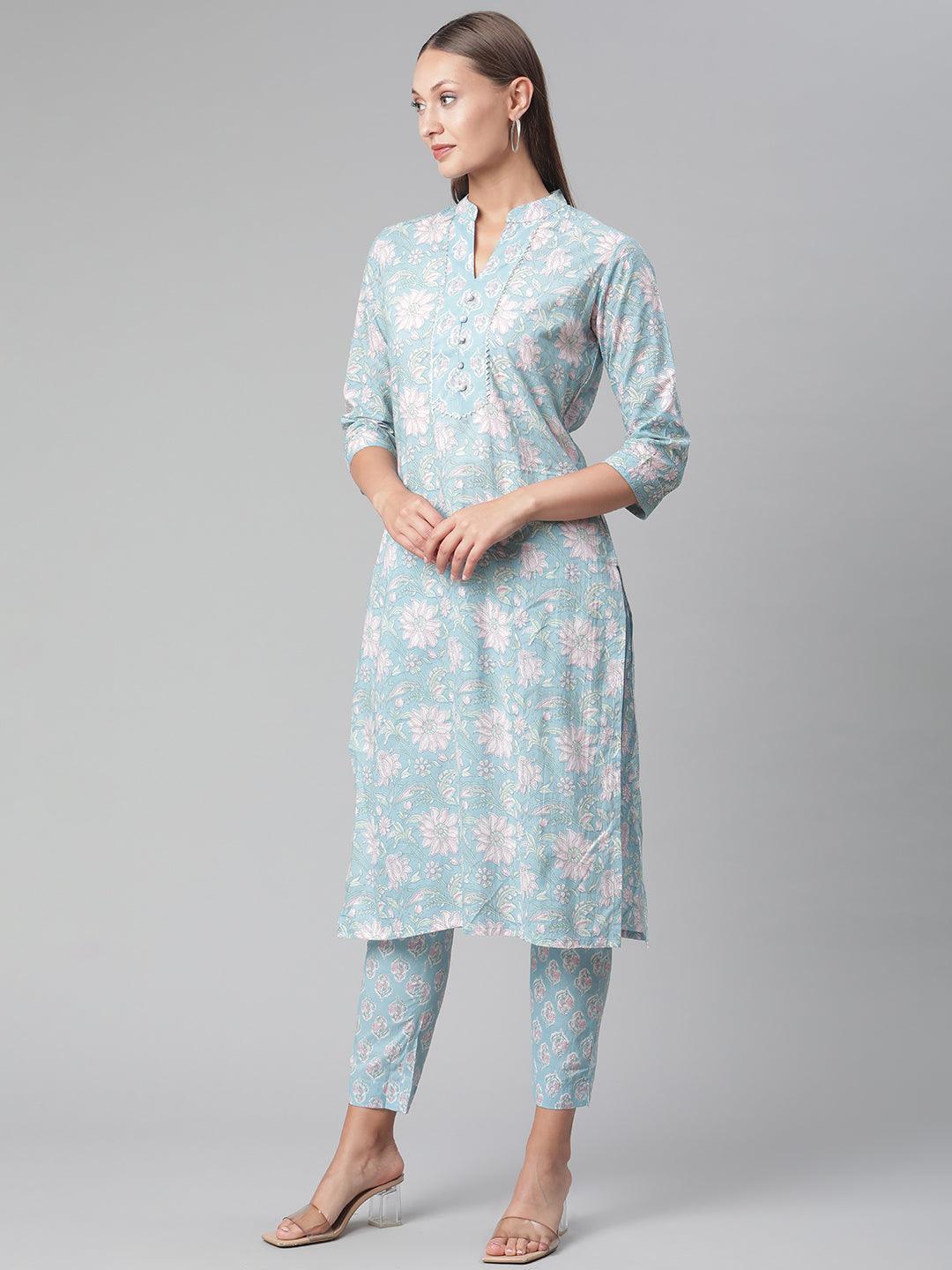 Light blue floral print cotton kurta pant set worn by a woman in sky blue