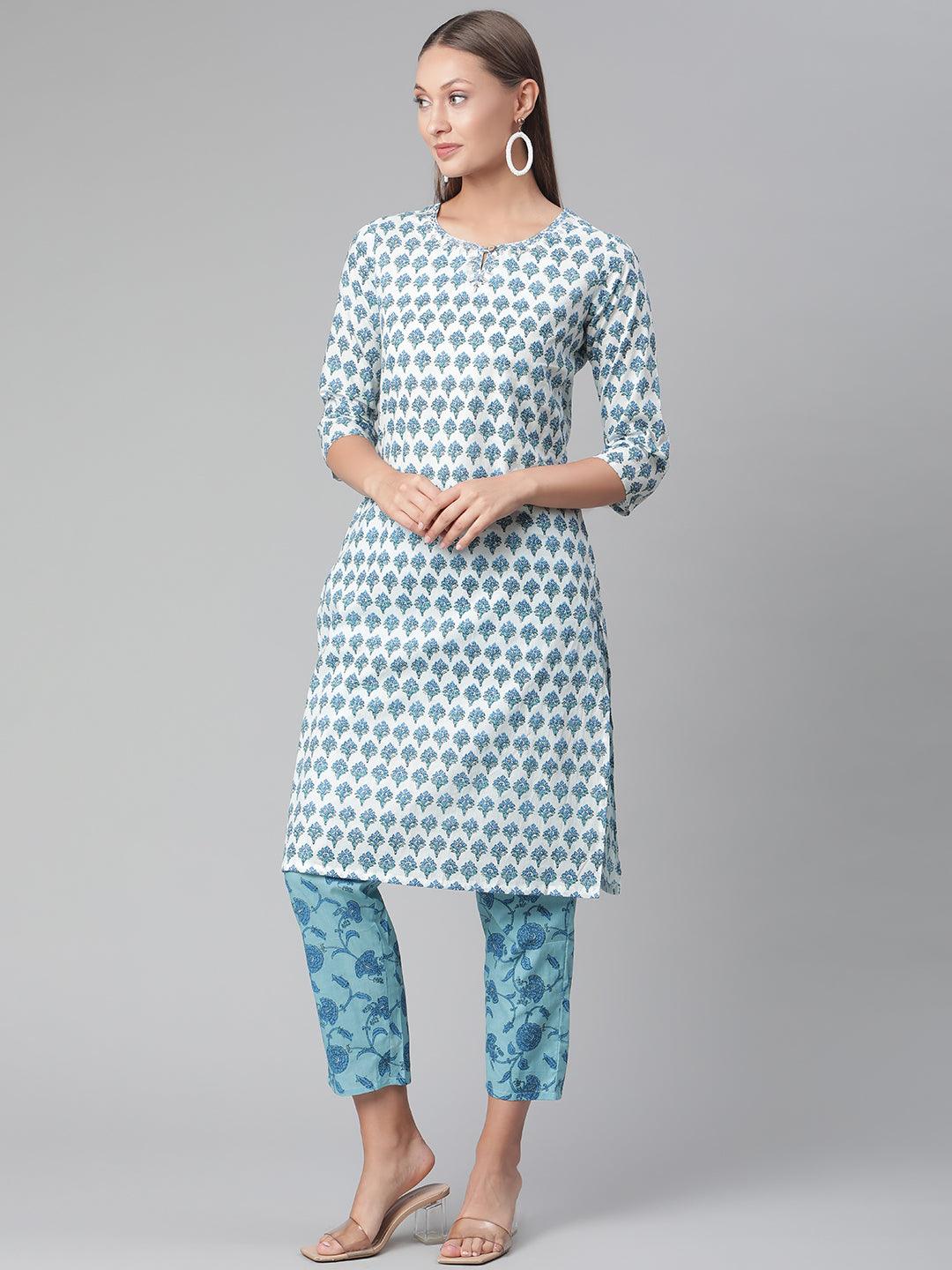 Patterned white cotton kurta with blue floral pants in a stylish kurta pant set