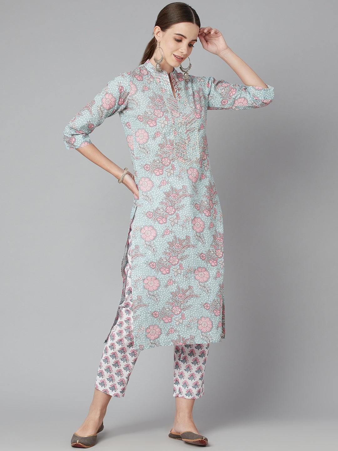 Woman wearing Grey Pastel Floral Printed Cotton Kurta Pant Set with matching pants