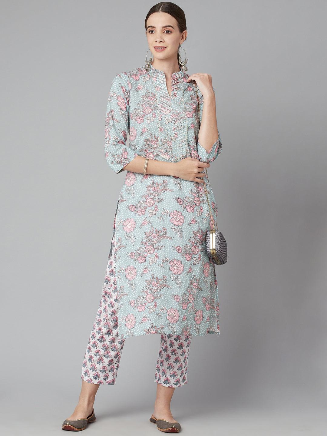 Woman wearing a Grey Pastel Floral Printed Cotton Kurta Pant Set with matching pants