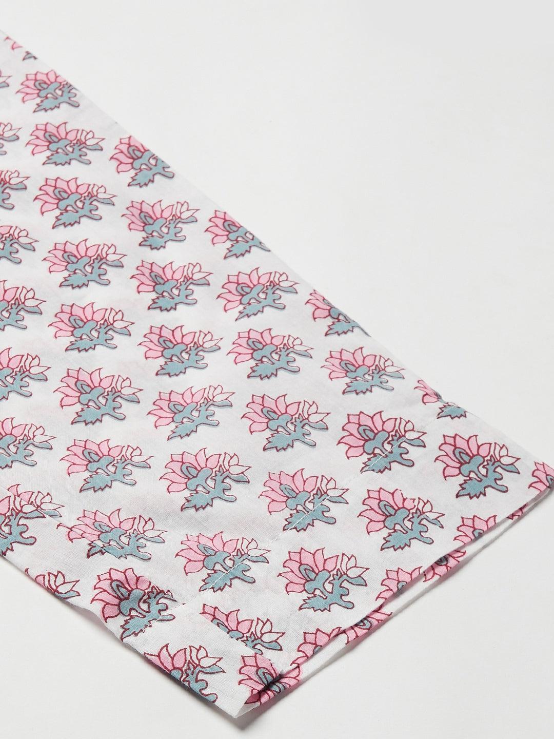 Pastel floral printed fabric featuring gray and pink lotus flowers for a kurta pant set