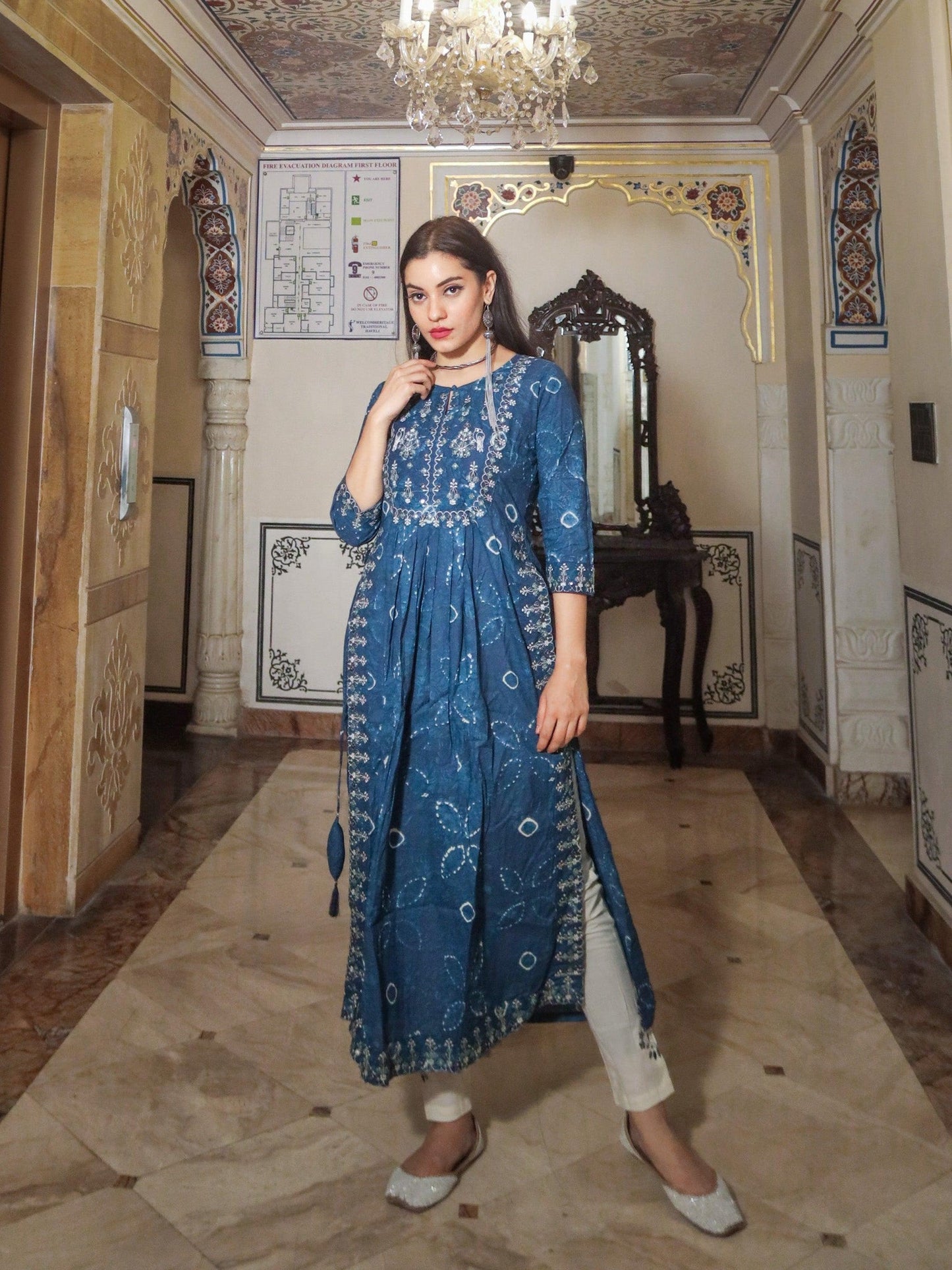 Blue Cotton Nyra Cut Kurta Pant Set featuring intricate floral embroidery design