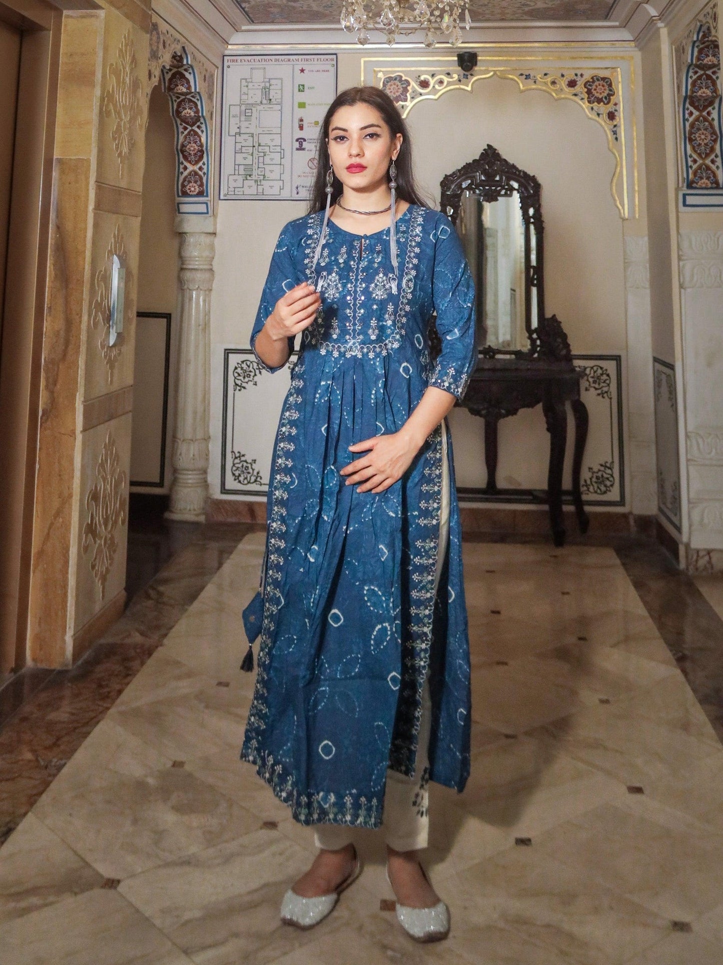 Blue Cotton Nyra Cut Kurta Pant Set featuring a floor-length dress with three-quarter sleeves