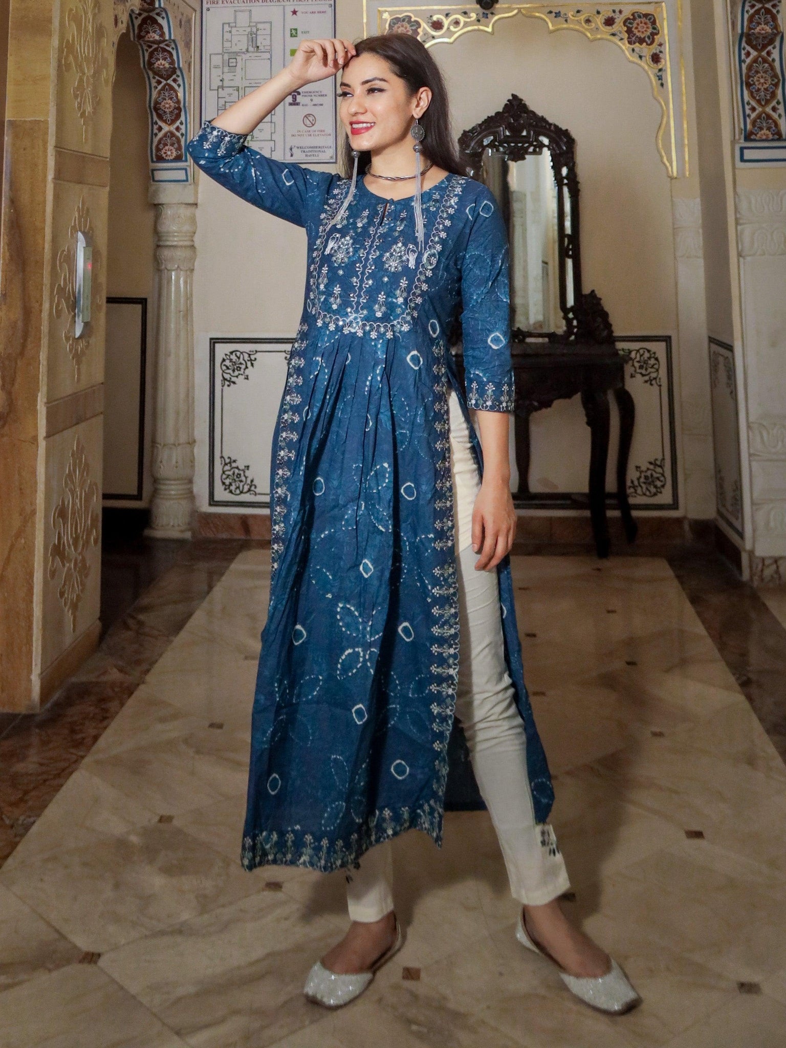 Long blue cotton Nyra Cut Kurta Pant Set with floral embroidery and three-quarter sleeves