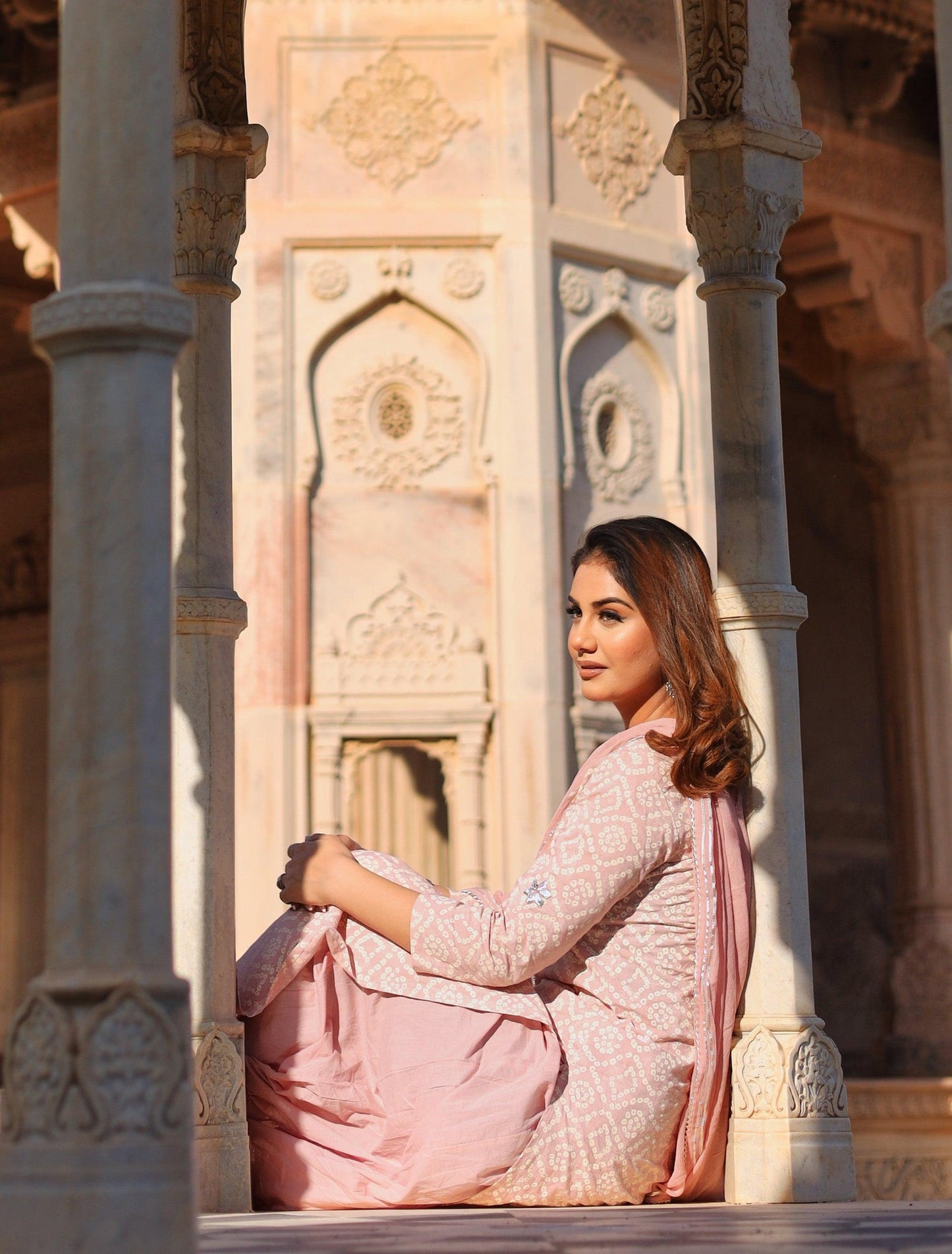 Woman in Light Pink Cotton Straight Kurta Palazzo set with Dupatta and Gota Patti details