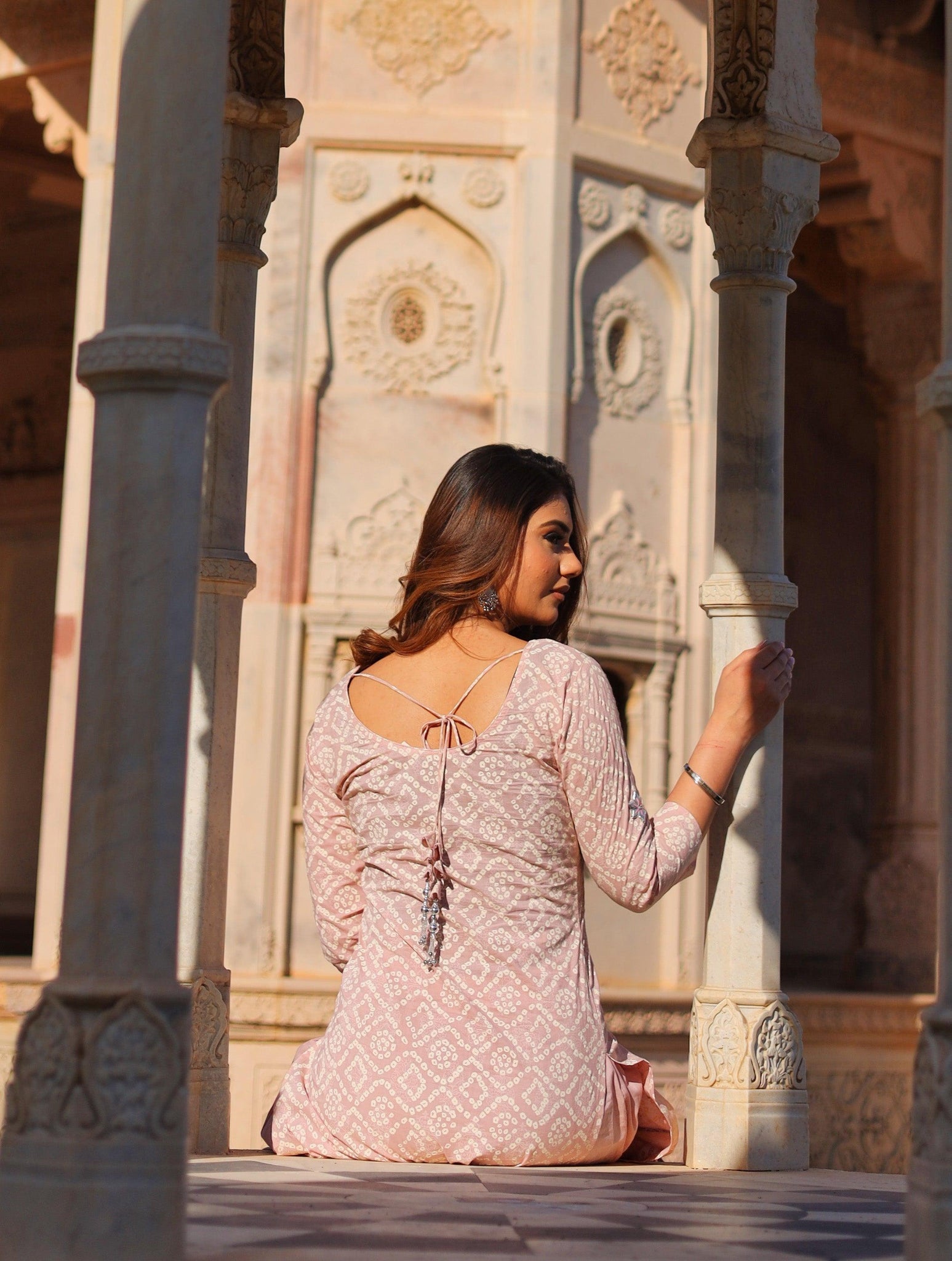 Woman in a pale pink lace dress featuring a Light Pink Cotton Straight Kurta Palazzo set