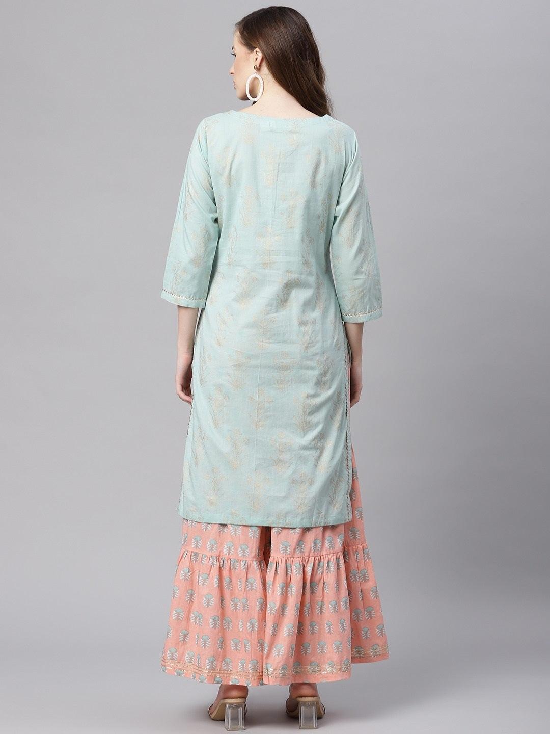 Mint green cotton kurta sharara set paired with a pink patterned skirt