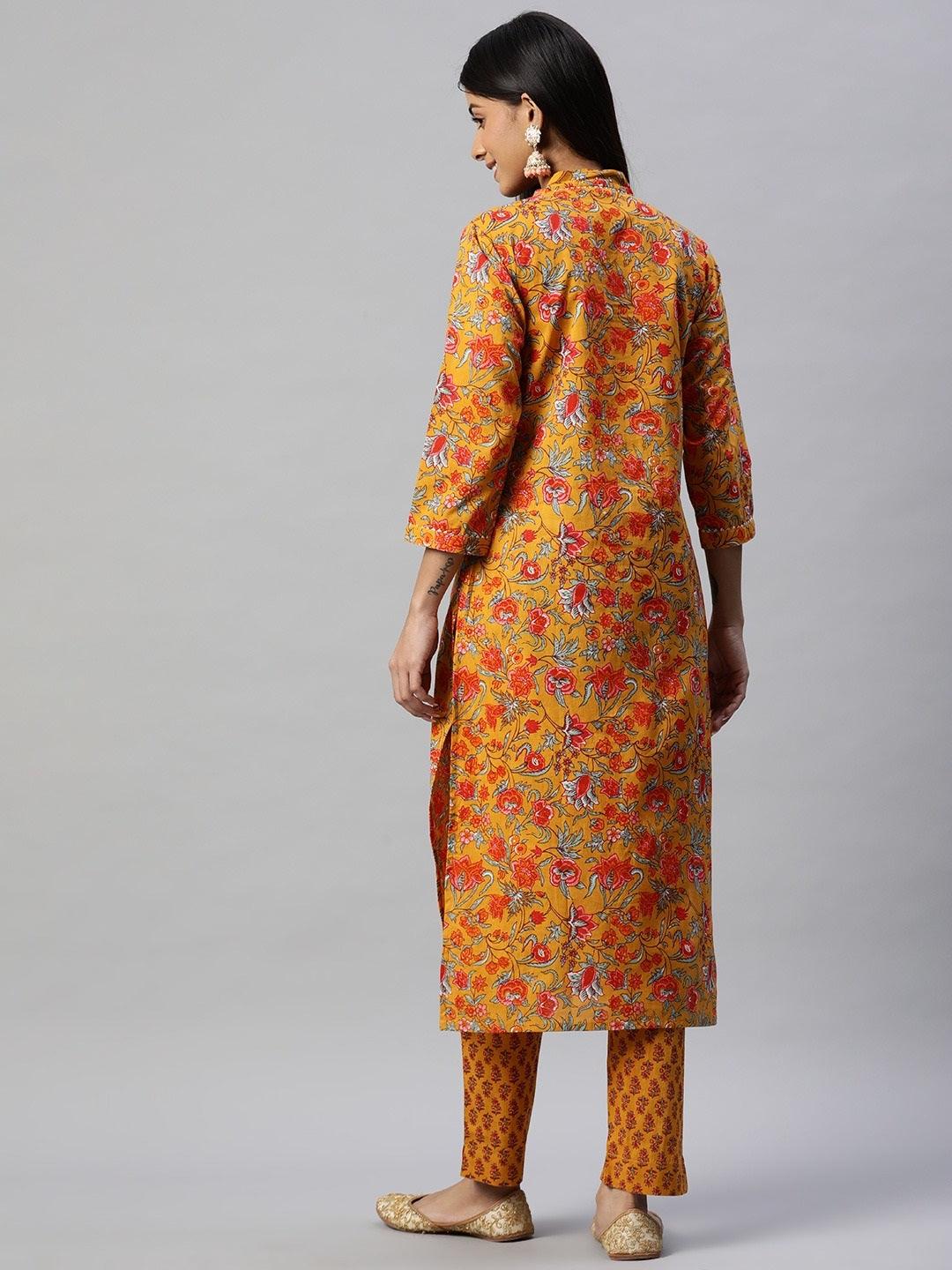 Colorful Mustard Cotton Floral Printed Kurta Pant Set with matching pants displayed