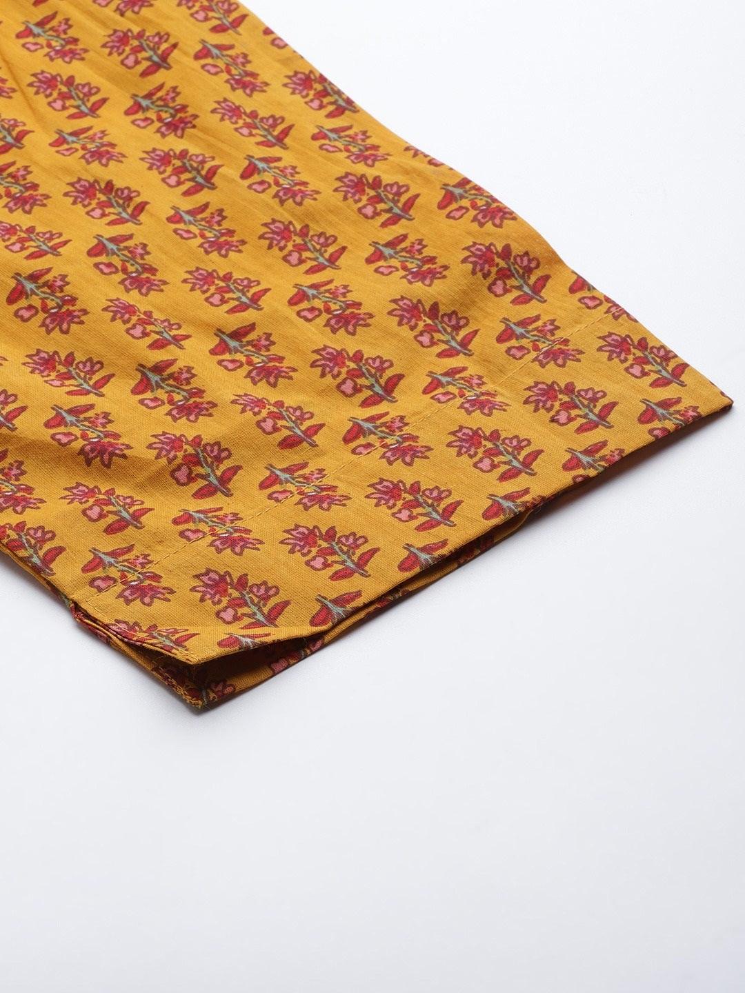 Mustard Cotton Floral Printed Kurta Pant Set featuring yellow fabric with red and brown flowers