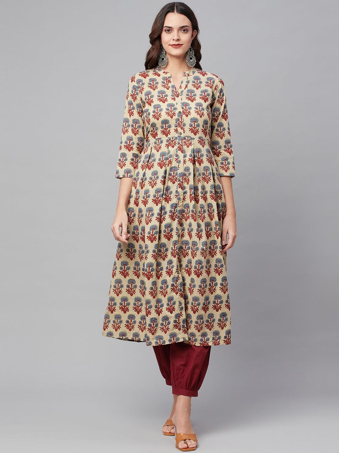 Floral print Beige Cotton A-Line Kurta Hem Cuffed Pant Set styled with red pants