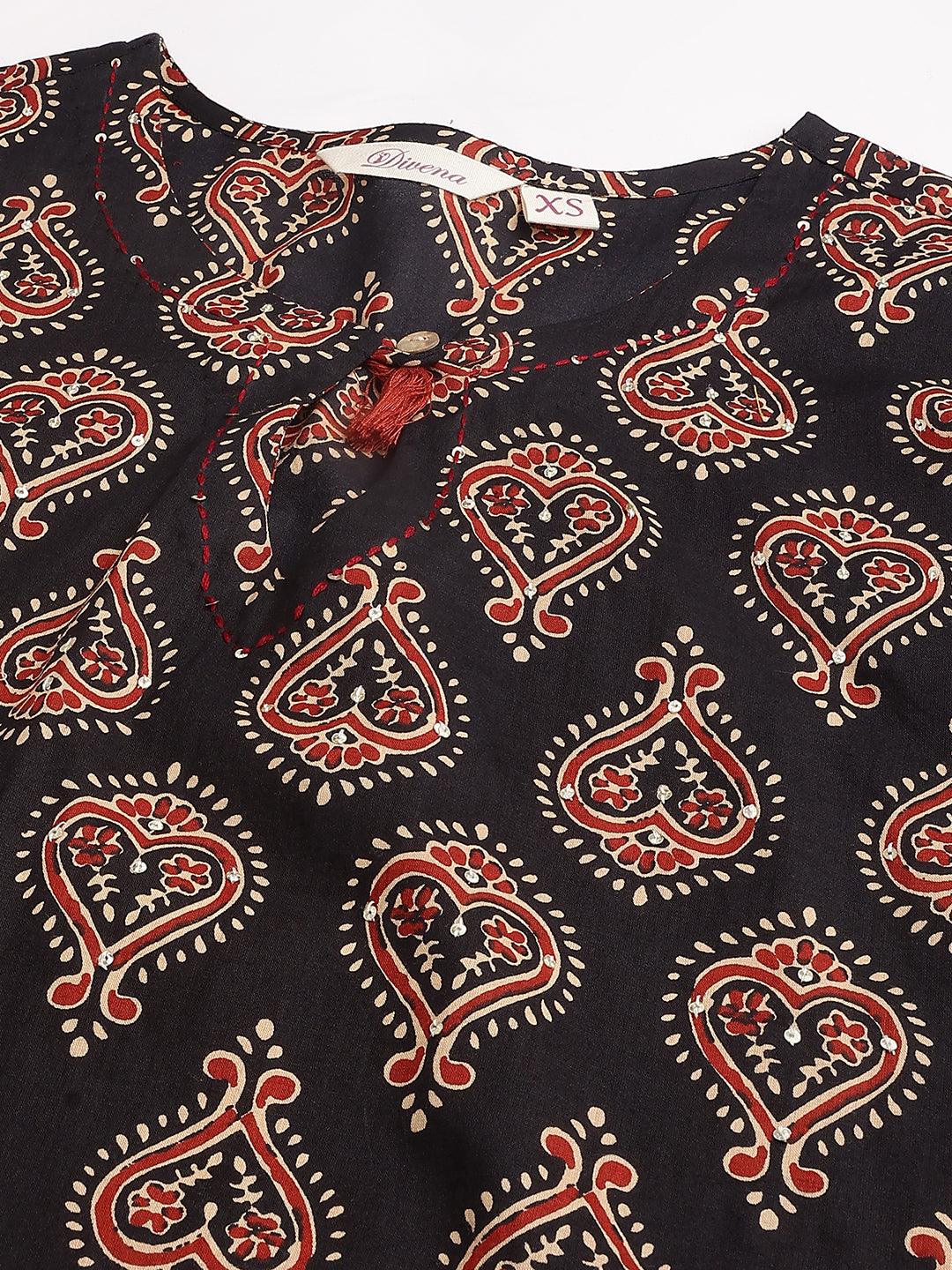 Patterned red cotton buti printed kurta with cuffed pant set on black background