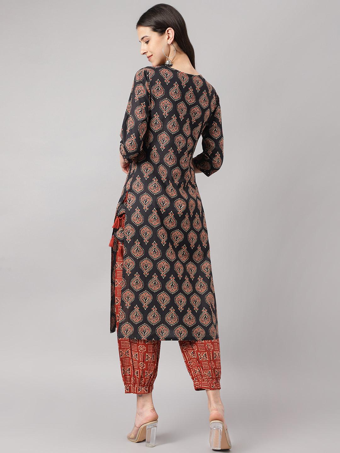 Woman wearing Black and Red Cotton Buti Printed Kurta with Cuffed Pant Set