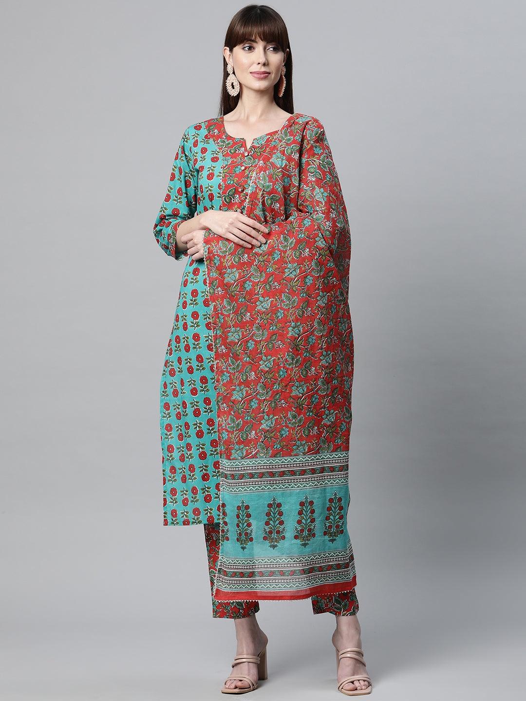 Colorful patterned Rama Green Cotton Straight Kurta Pant Set worn by a woman with bangs