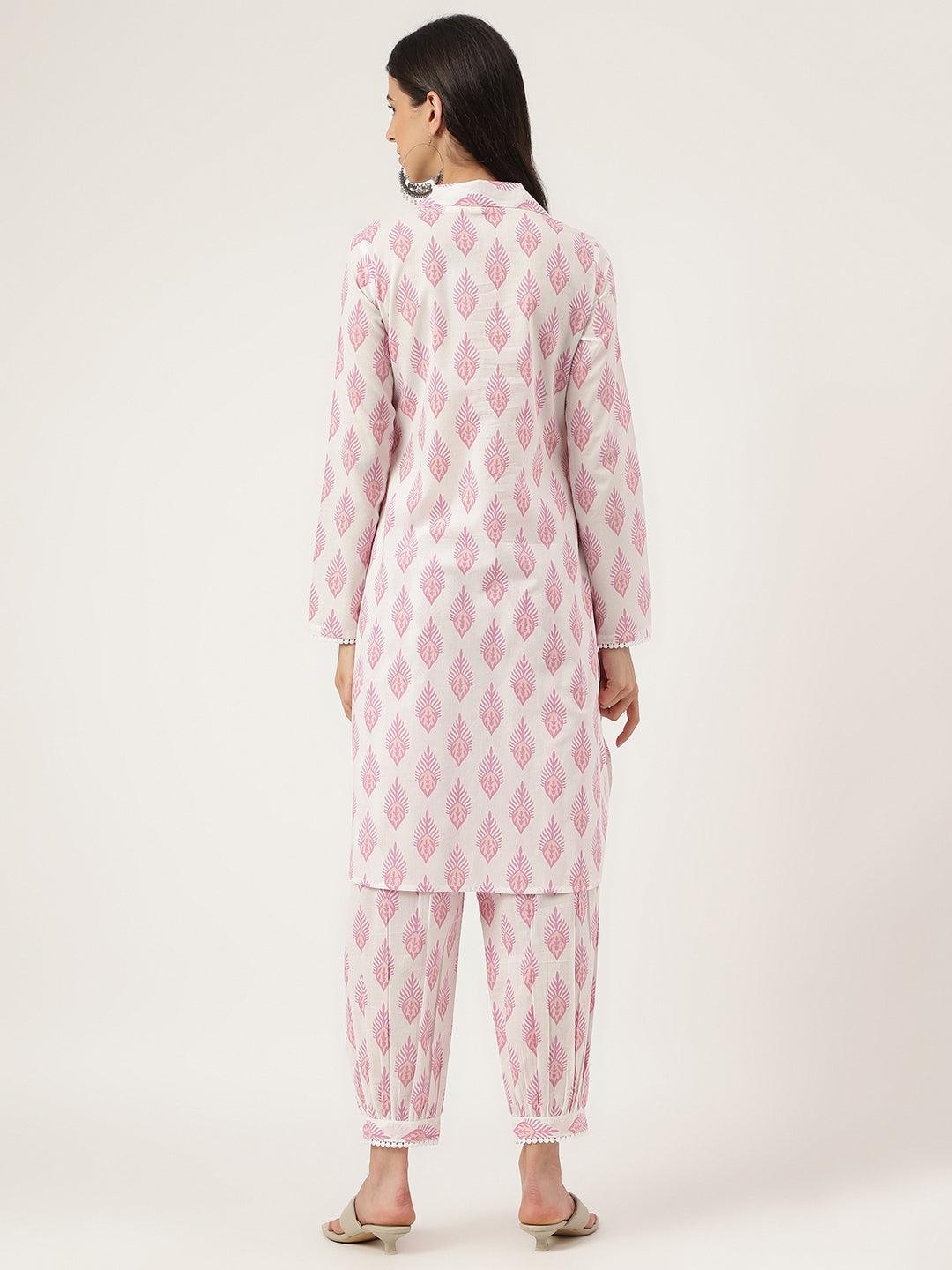 Woman wearing a Pink and White Cotton Straight Kurta Hem Cuffed Pant set from behind