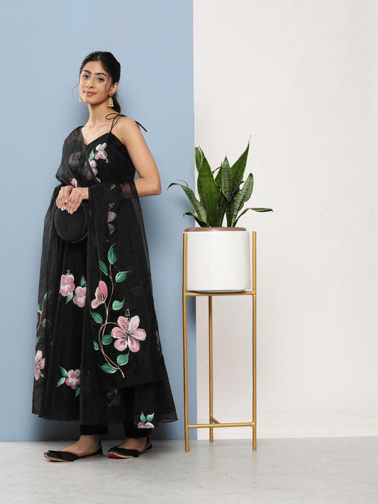 Woman wearing a Black Hand Painted Floral Anarkali Kurta Pant Set with Dupatta