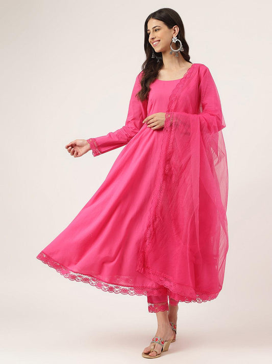 Vibrant Pink Solid Anarkali Kurta Pant Set with Dupatta featuring flowing sleeves and lace trim