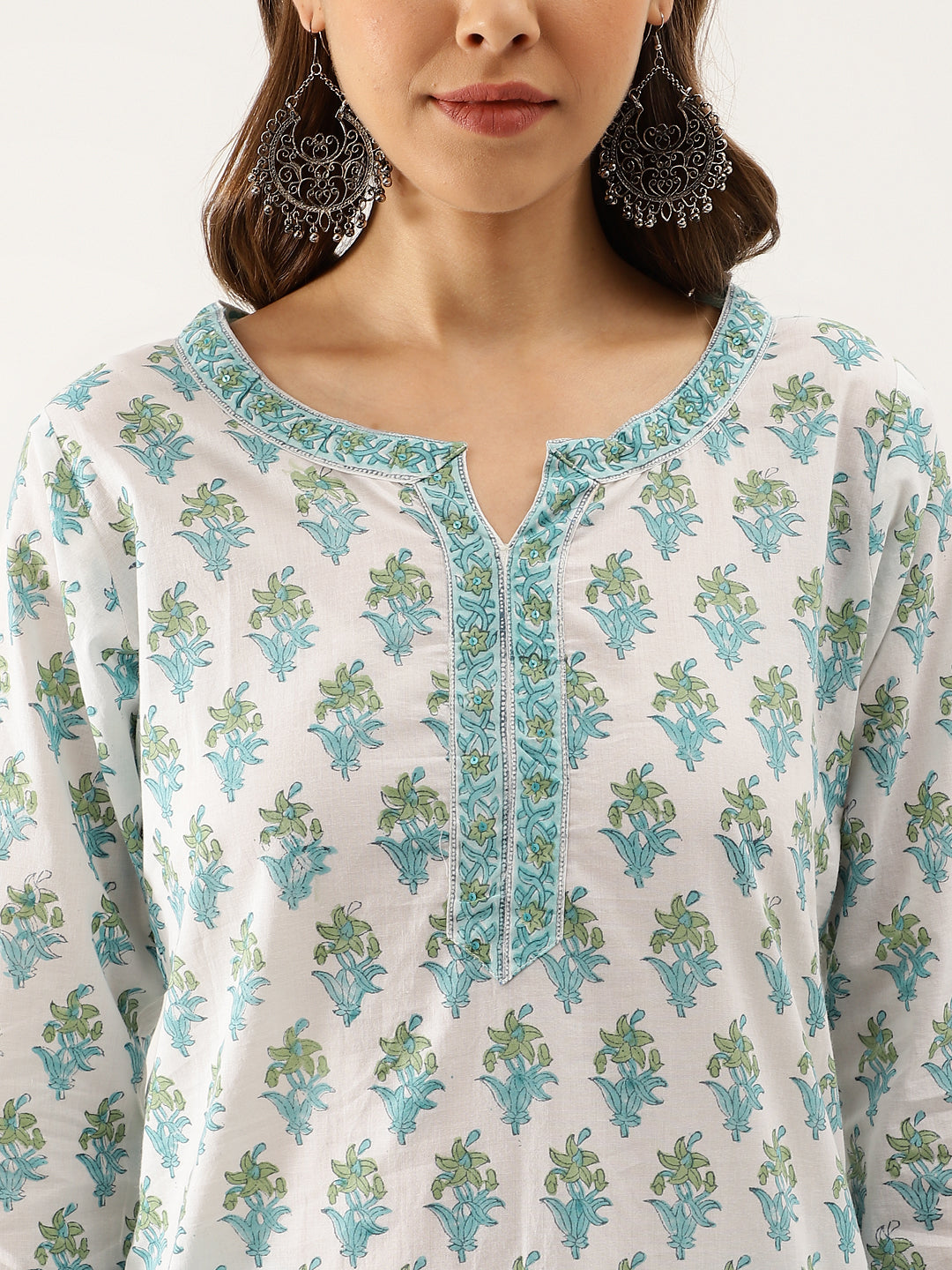 Floral handblock printed cotton kurta set in sea blue with embroidered neckline and earrings