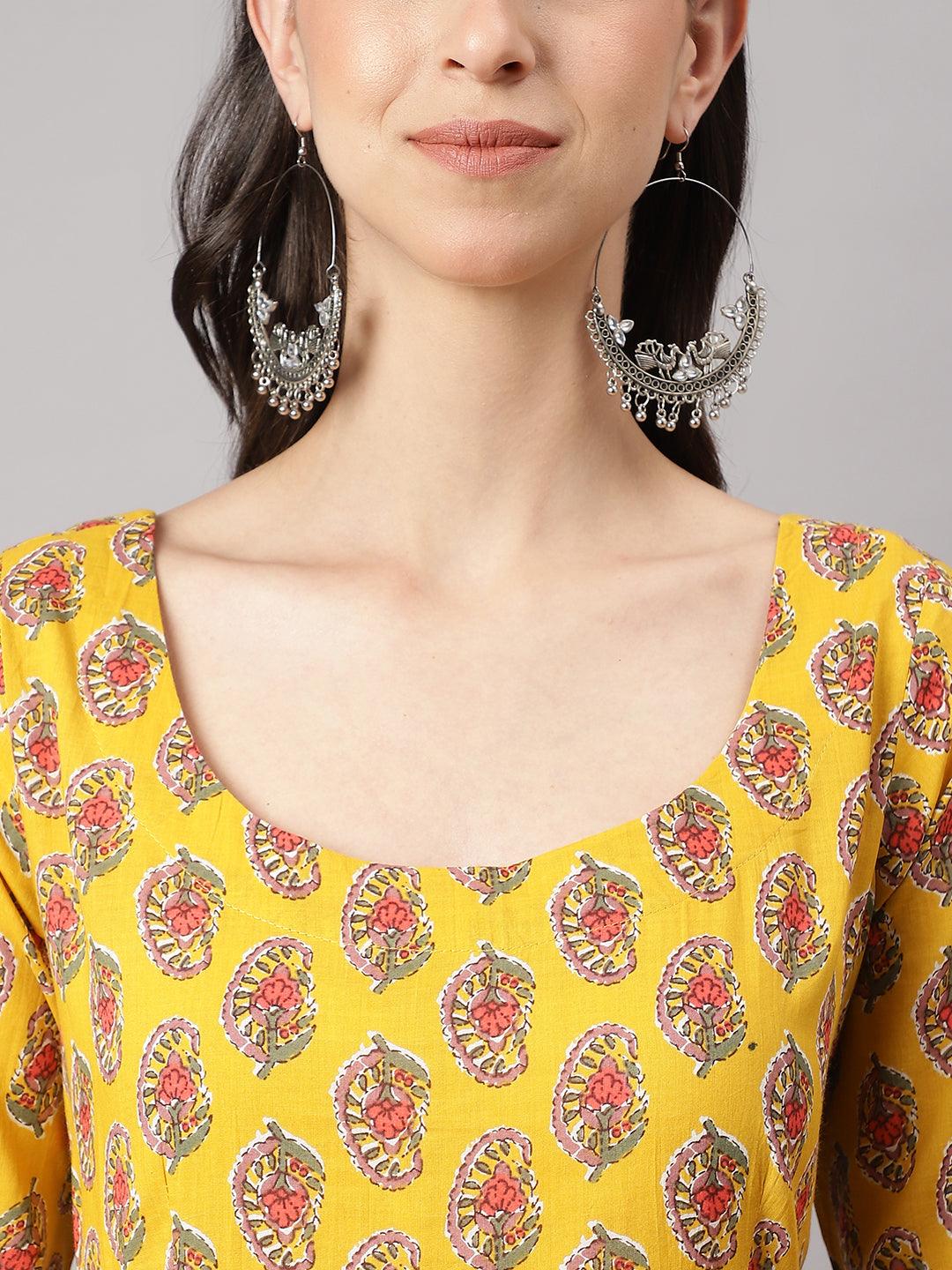 Ornate silver hoop earrings complement Yellow Cotton Anarkali Kurta Pant Set with Dupatta