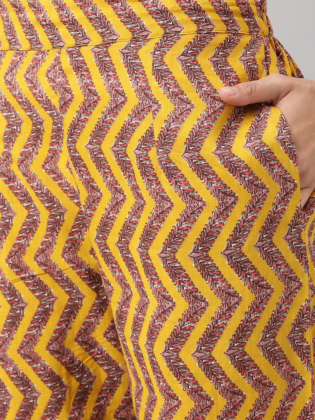 Patterned yellow cotton anarkali kurta pant set with purple zigzag stripes