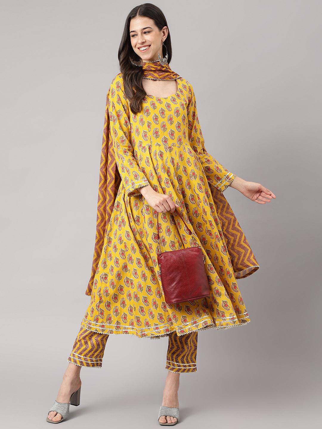 Yellow Cotton Anarkali Kurta Pant Set with Dupatta and red handbag, perfect for festive wear