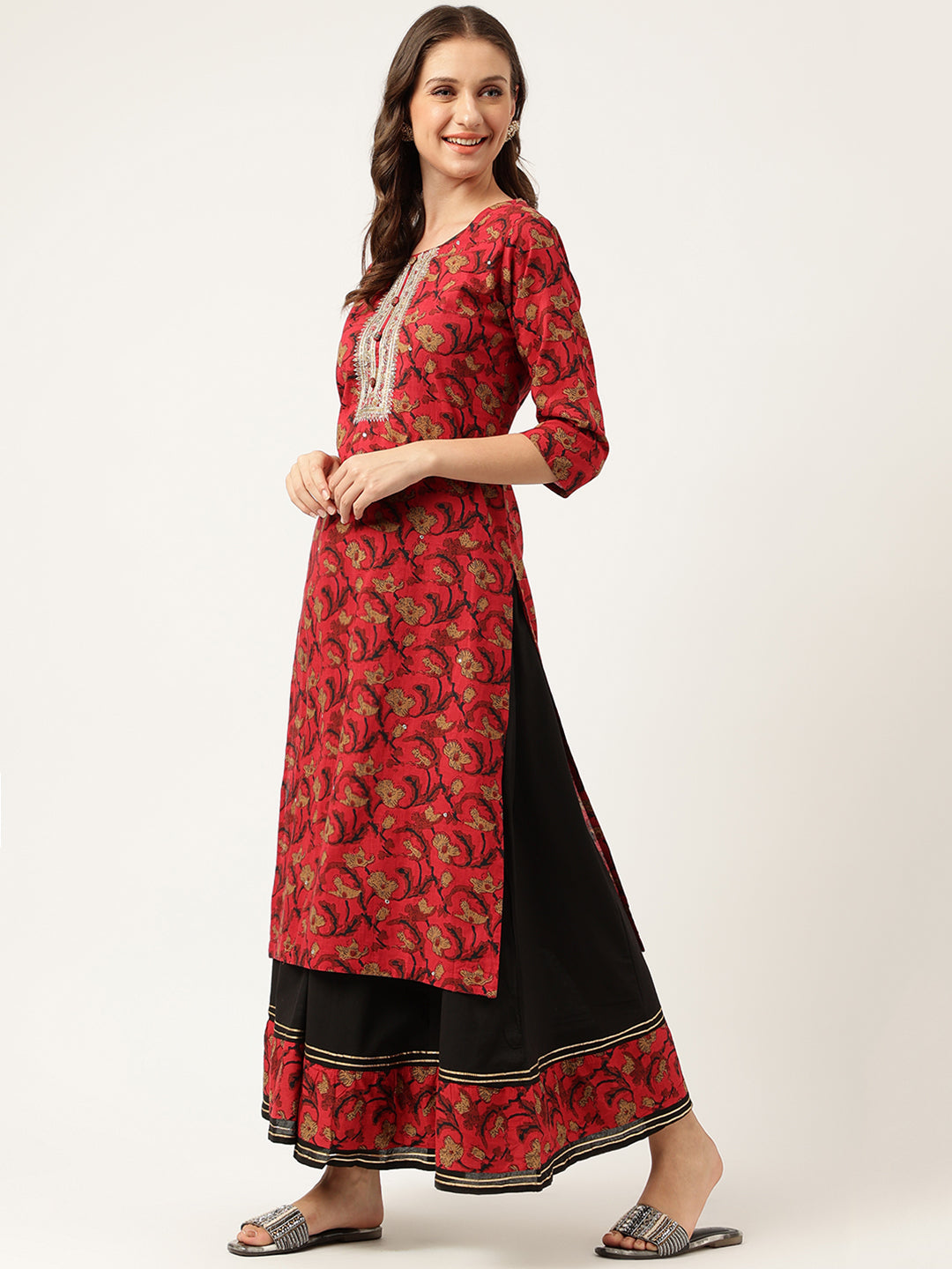 Red and black floral printed cotton kurta with sharara set worn by a woman