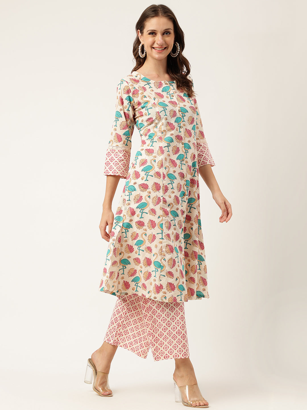 Smiling woman in Floral Cotton Kurta with Trouser set showcasing floral print design