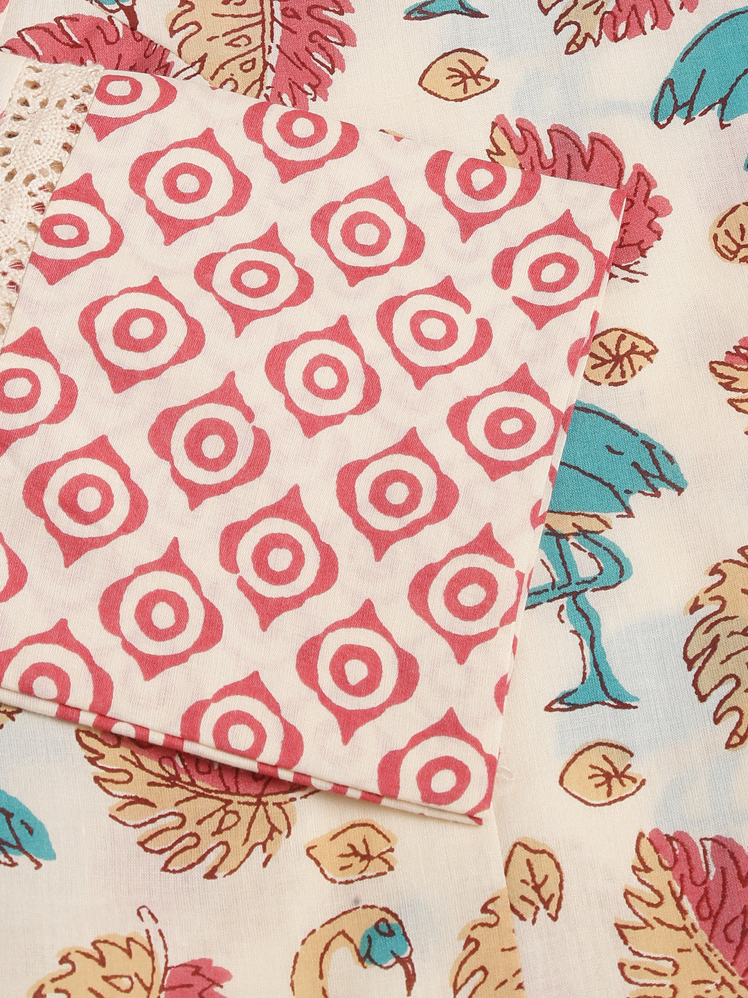 Piece of fabric featuring a pink circular target pattern for Floral Cotton Kurta