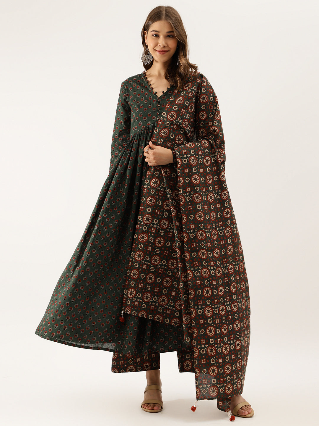 Woman in a Green Floral Print Cotton Kurta Set with matching shawl or wrap