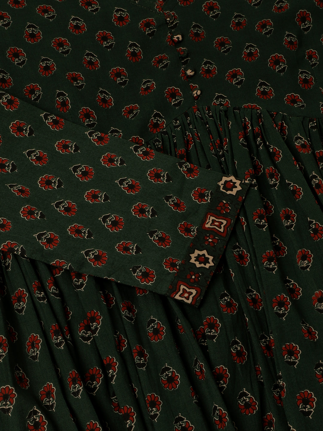 Dark green fabric with red and black floral motifs in Green Floral Print Cotton Kurta set