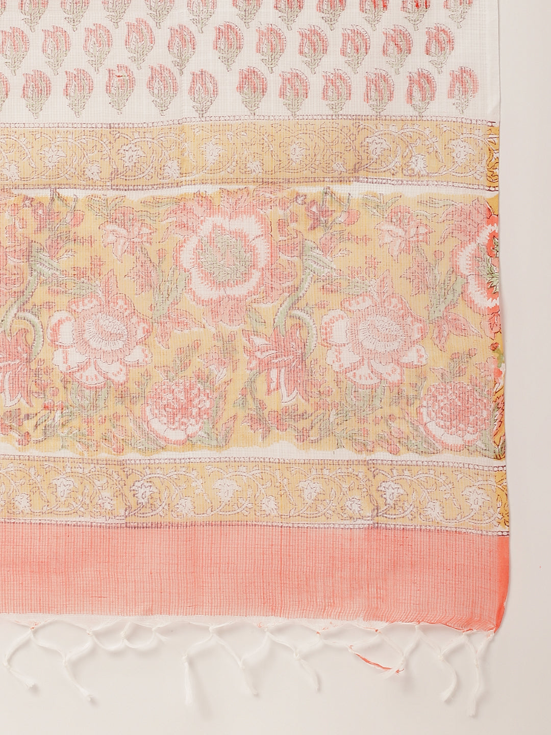 Textile fragment showcasing soft pink and beige hand block floral patterns for print cotton kurta