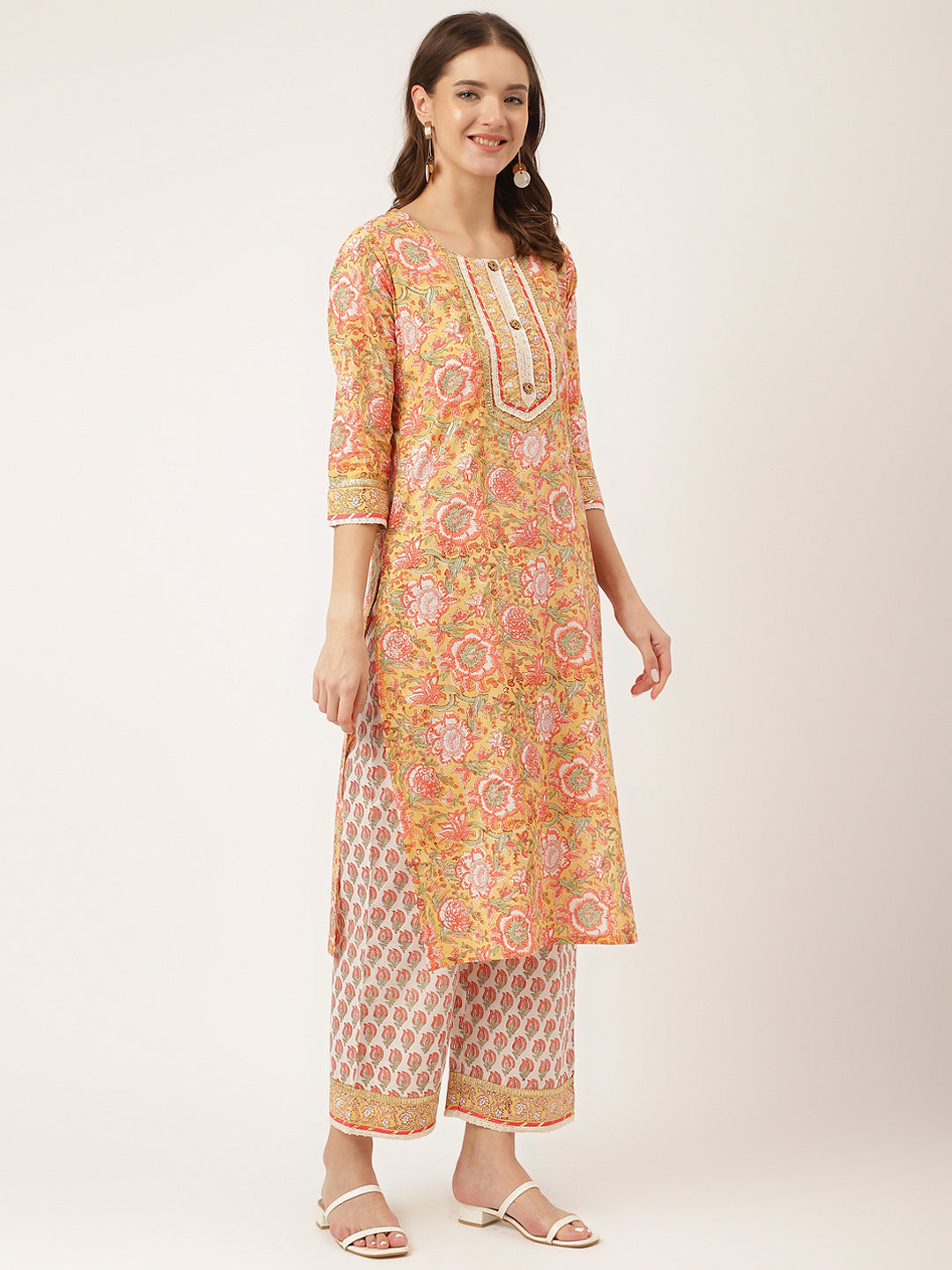 Smiling woman wearing Yellow Hand Block Floral Print Cotton Kurta, Trouser With Dupatta