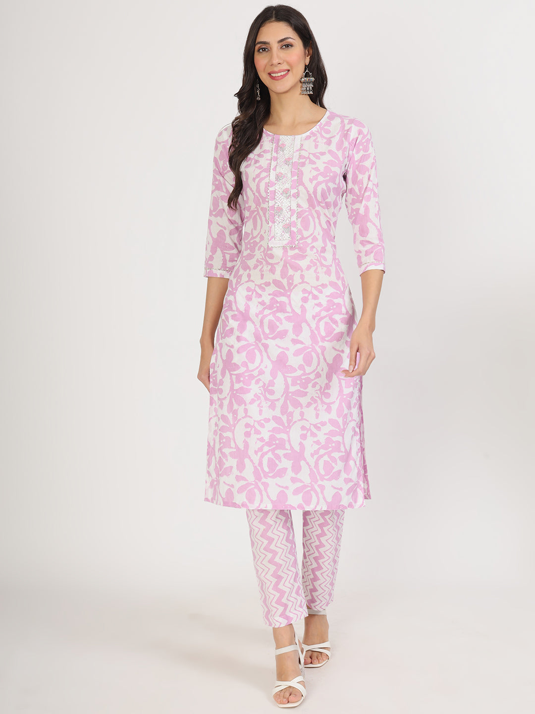 Woman in Purple Floral Print Cotton Kurta Pant with Dupatta set, featuring pink and white floral design