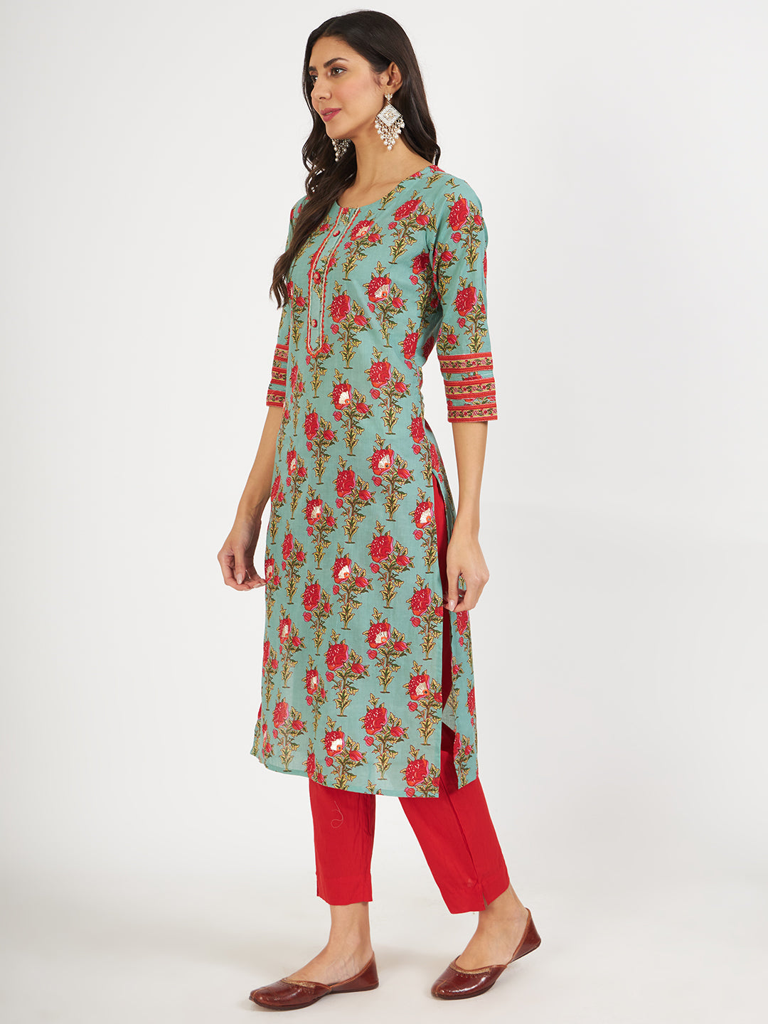 Green Floral Print Cotton Kurta for Women paired with red pants and a dupatta set