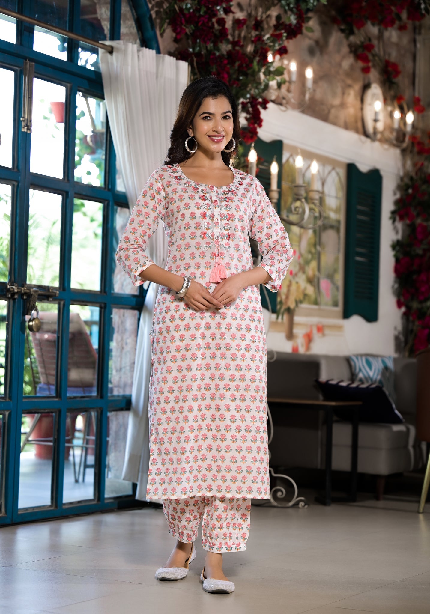 Woman in pink floral printed cotton kurta with trouser from Unicorn Fashion