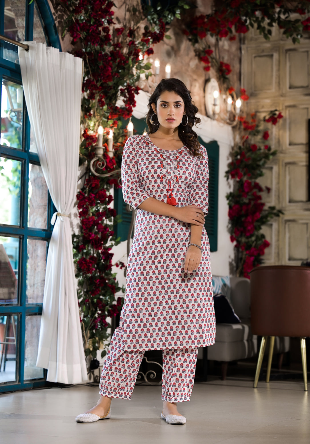 Woman in White & Red Floral Printed Cotton Kurta with Trouser from Unicorn Fashion