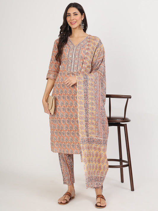 Woman in a Brown Embroidered Cotton Kurta Pants with Dupatta set showcasing intricate patterns