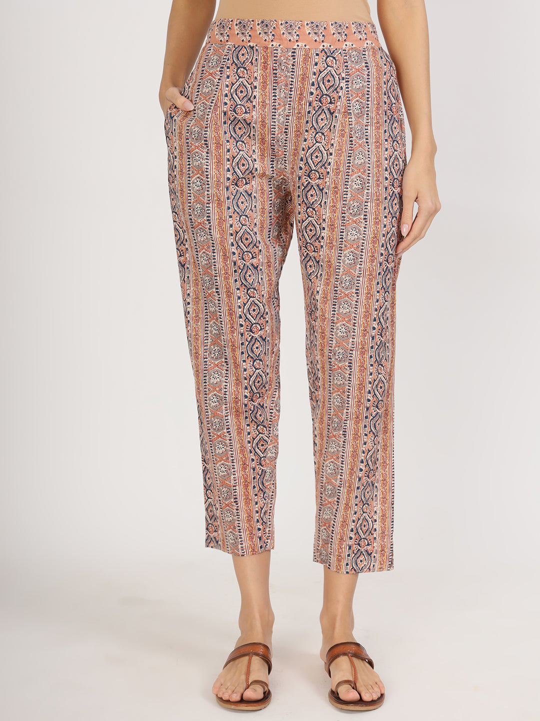 Patterned loose-fitting cropped cotton kurta pants in muted pink and blue tones