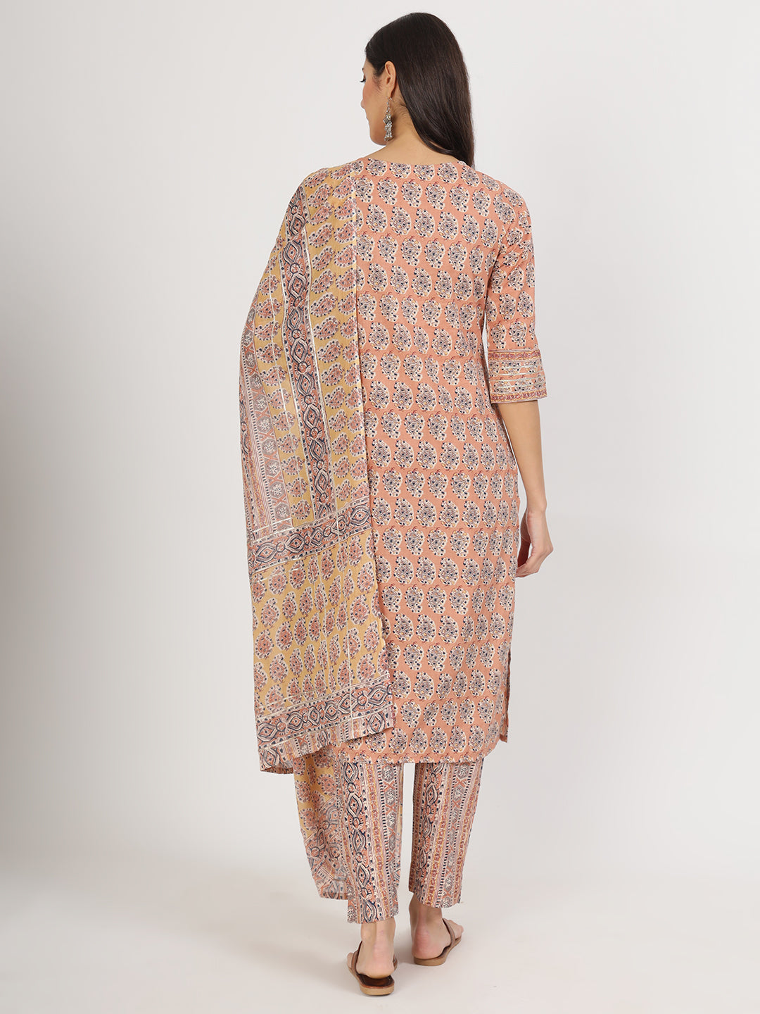 Vibrant brown embroidered cotton kurta pants and matching dupatta worn by a woman