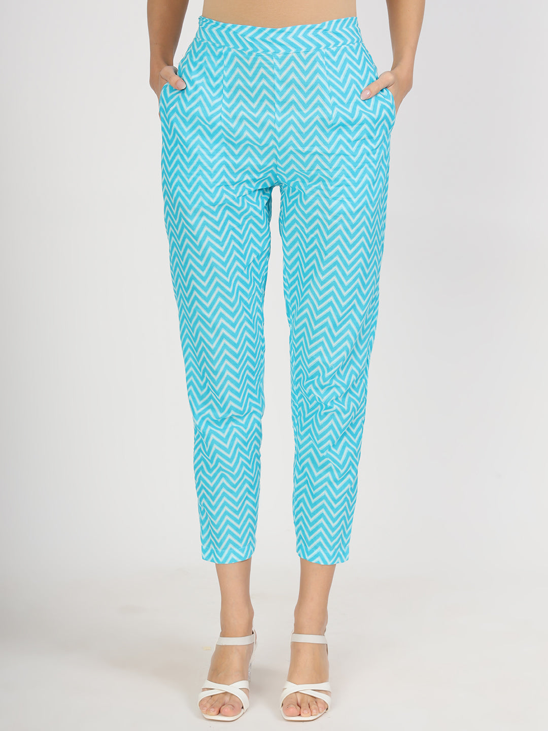 Bright turquoise pants with a white zigzag pattern from a Blue Floral Print Cotton Kurta Set for Women