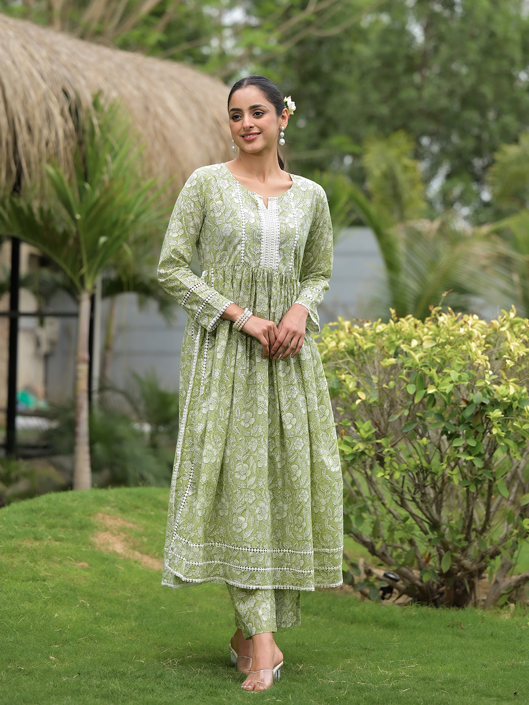 Light green floral print cotton Nyra Cut Kurta Pant Set with white embroidery details